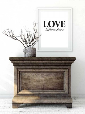 Woonposter zwart wit love lives here